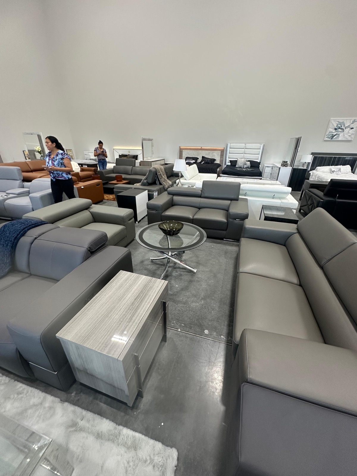 Metropolitan Market and Decor Houston showroom with modern gray leather sofas on display